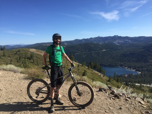 Greyson poses with the view from the Donner Lake Rim Trail.